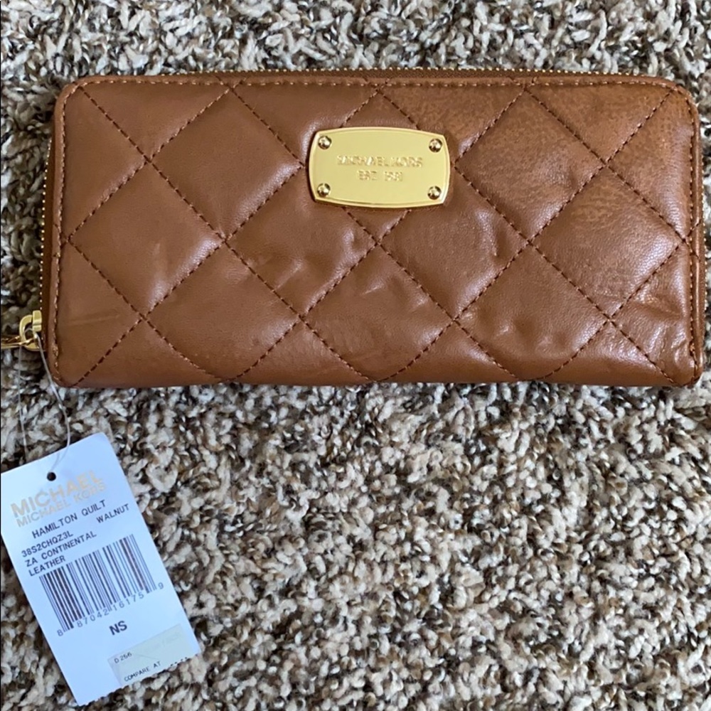 Brown Michael Kors wallet.
